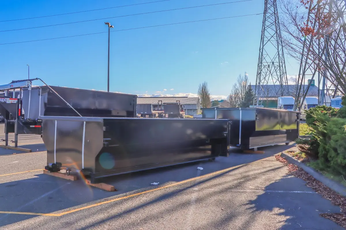 Roll-off dumpster ready for waste disposal at job site for 3 Yard Dumpster Rental in Armada